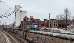 WE 6348 heads back through downtown.